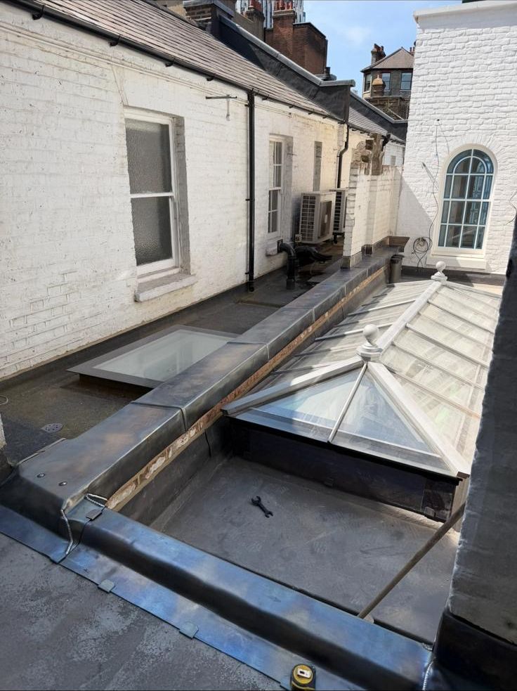 Lead capping and flashings around a roof lantern